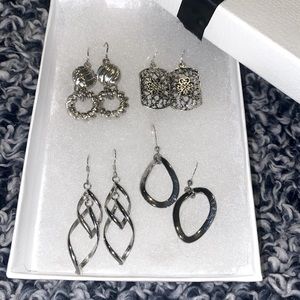 Silver earring set.